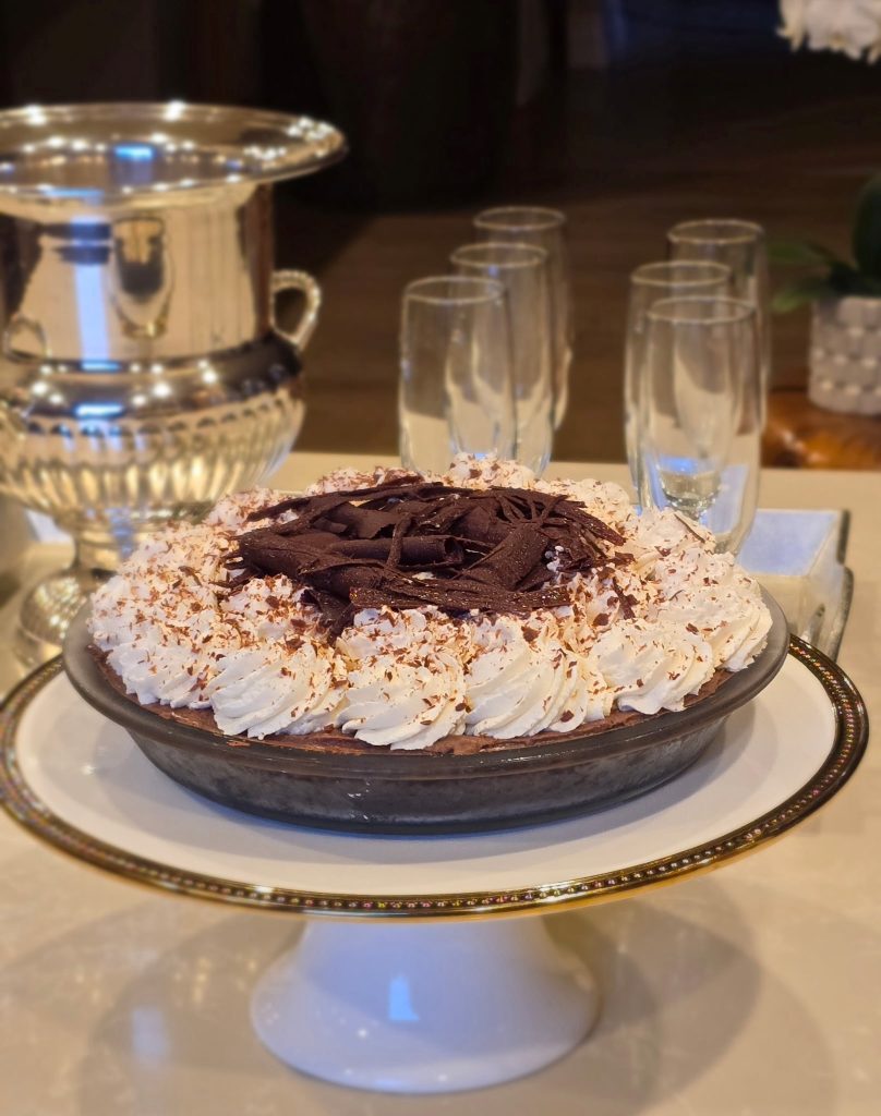 Chocolate cream pie on elegant display